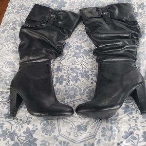 Torrid wide calf boots.